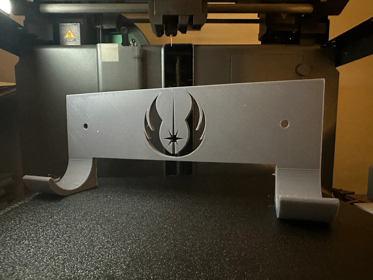 Support Mural Sabre Laser avec Logo Jedi - Geek Print