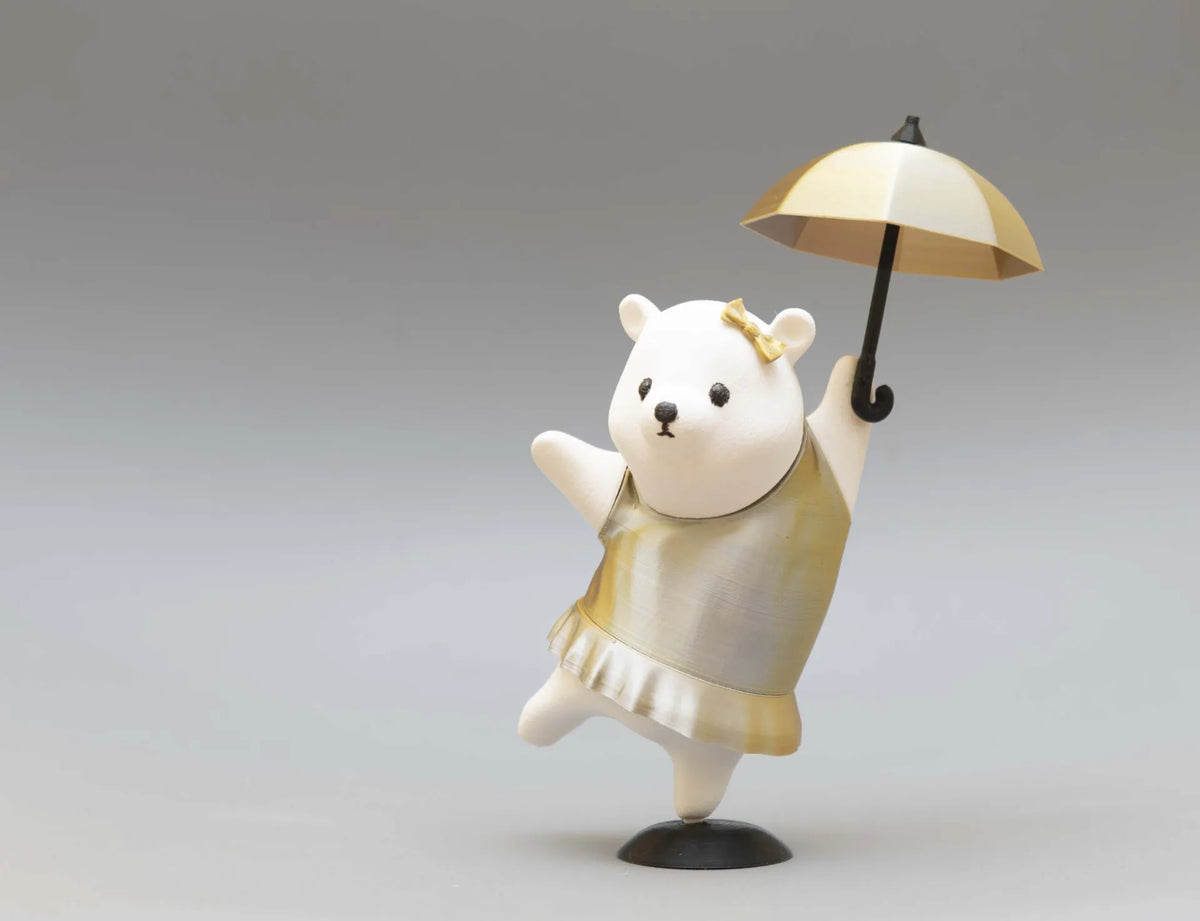 Figure charmante d'une fille-ours dansant avec un parapluie - Geek Print