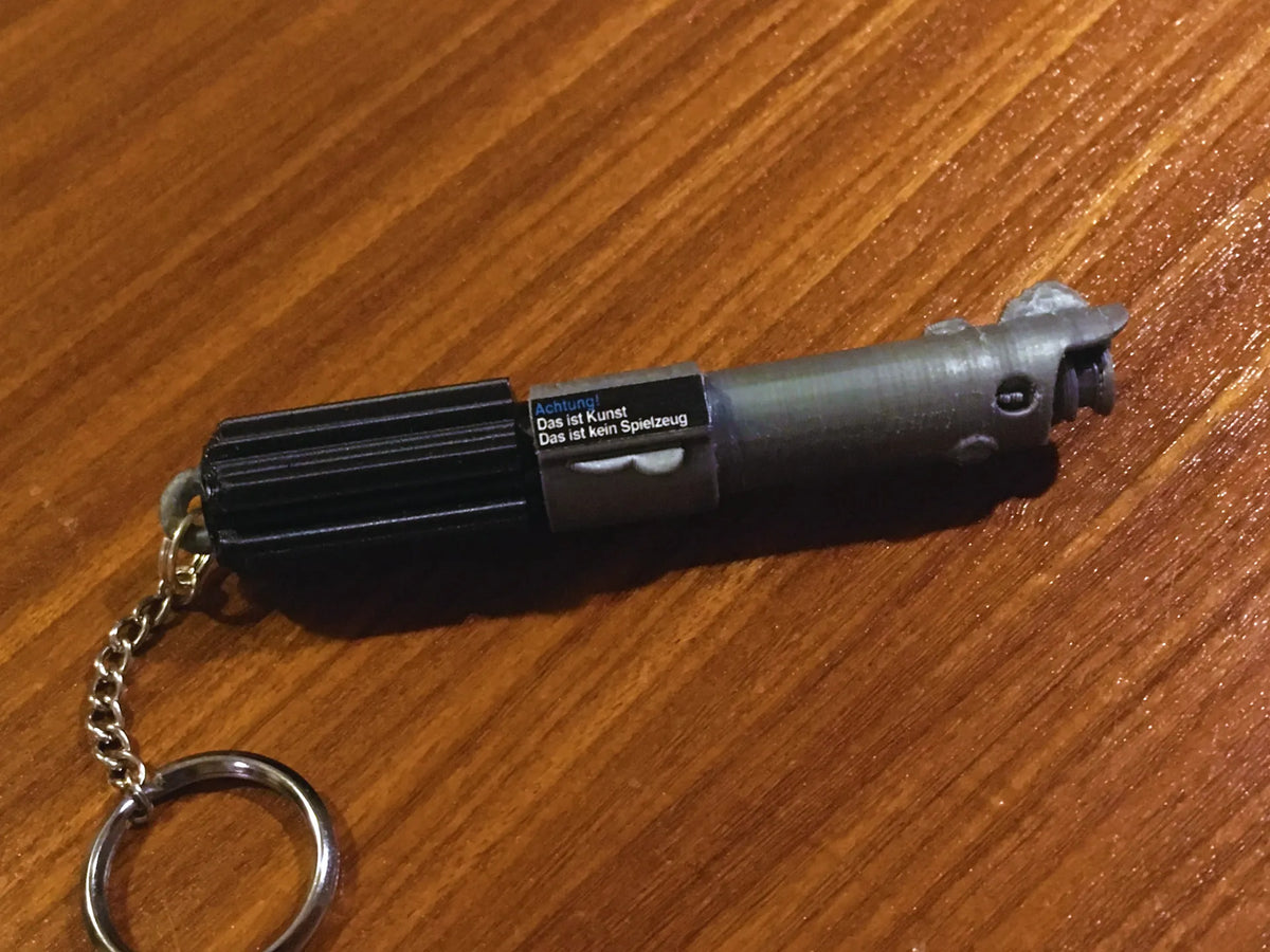 Porte-clés Sabre Laser Porte-Bonheur - Auto Print