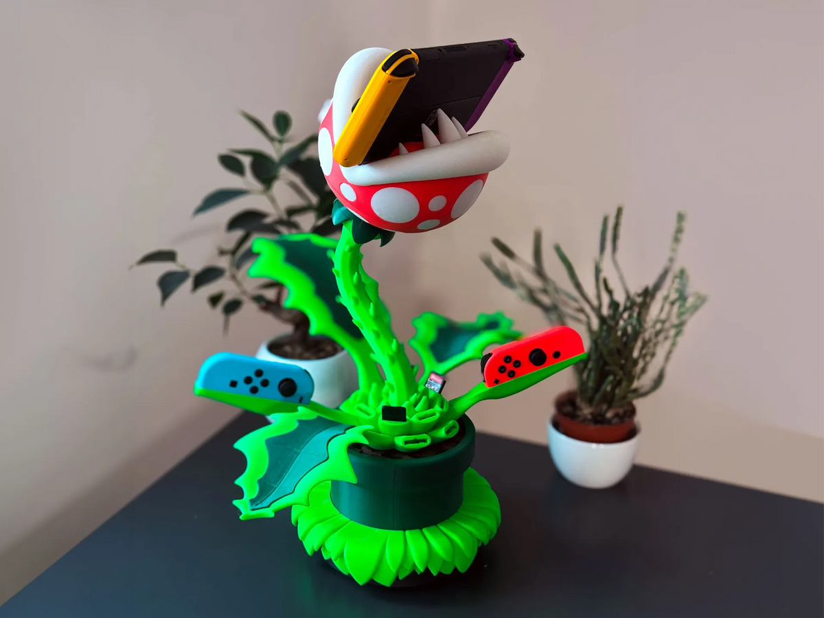 Support de la console Nintendo Switch en forme de Plante Piranha (Chargeur et Hub TV) - Jeux Print