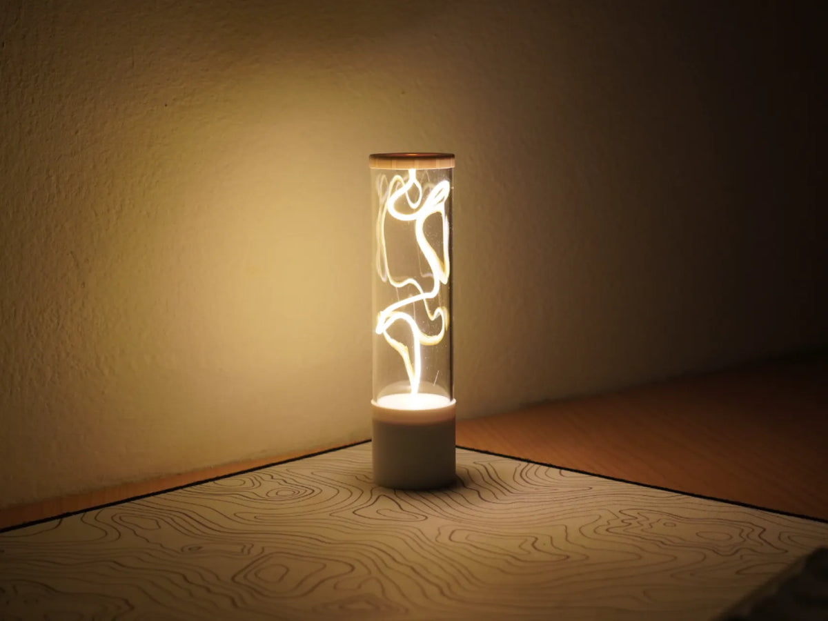 Lampe de bureau LED à design oscillant unique et rechargeable - Lumière Print