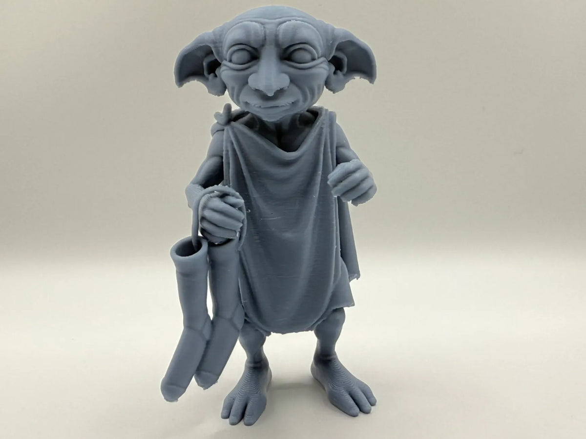 Figurine elfe Dobby avec chaussettes (Harry Potter) - Geek Print