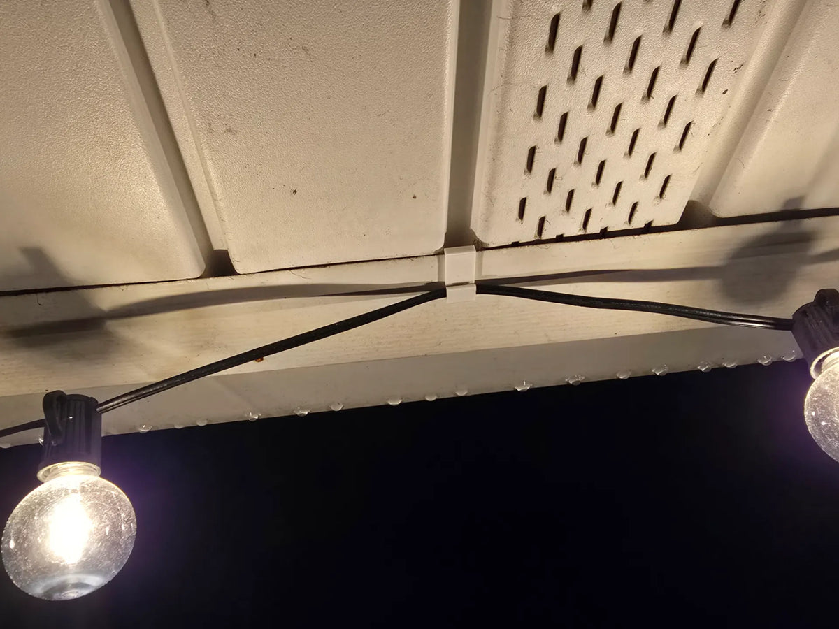 Clips de soffite pour guirlandes lumineuses Profil bas - Lumière Print