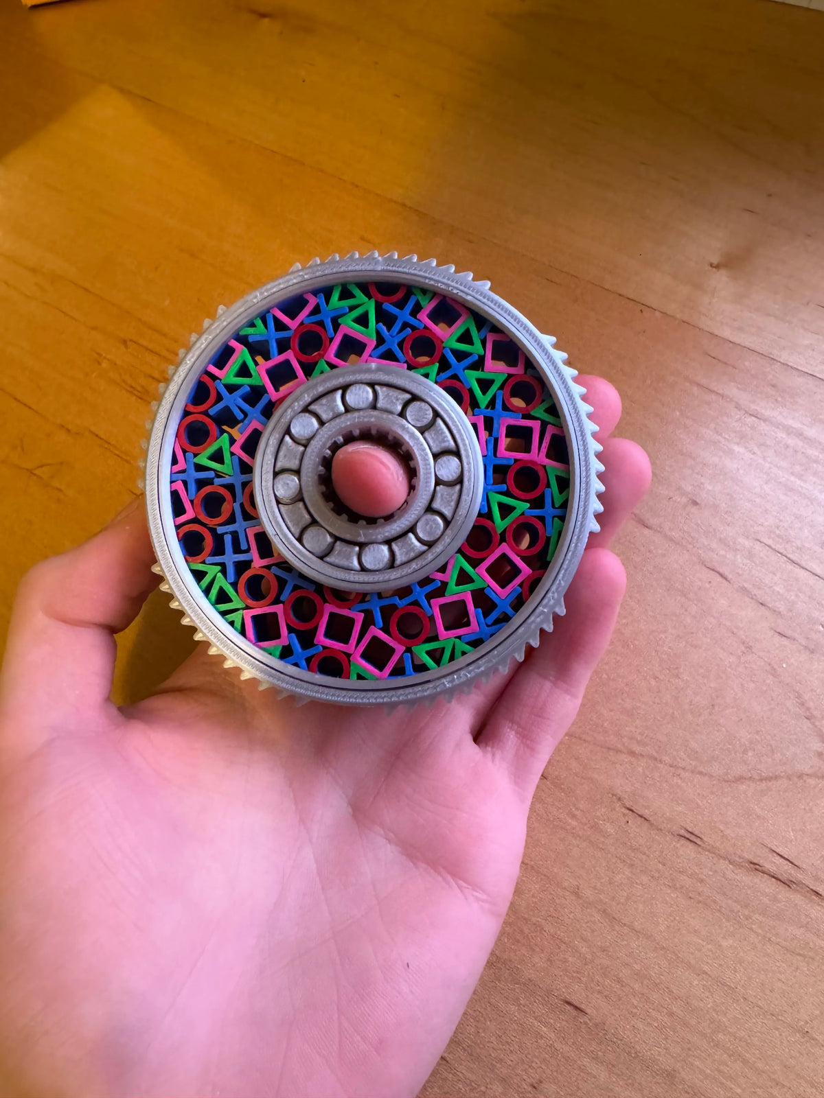 Fidget Spinner sur le thème de la PS1 - Jeux Print