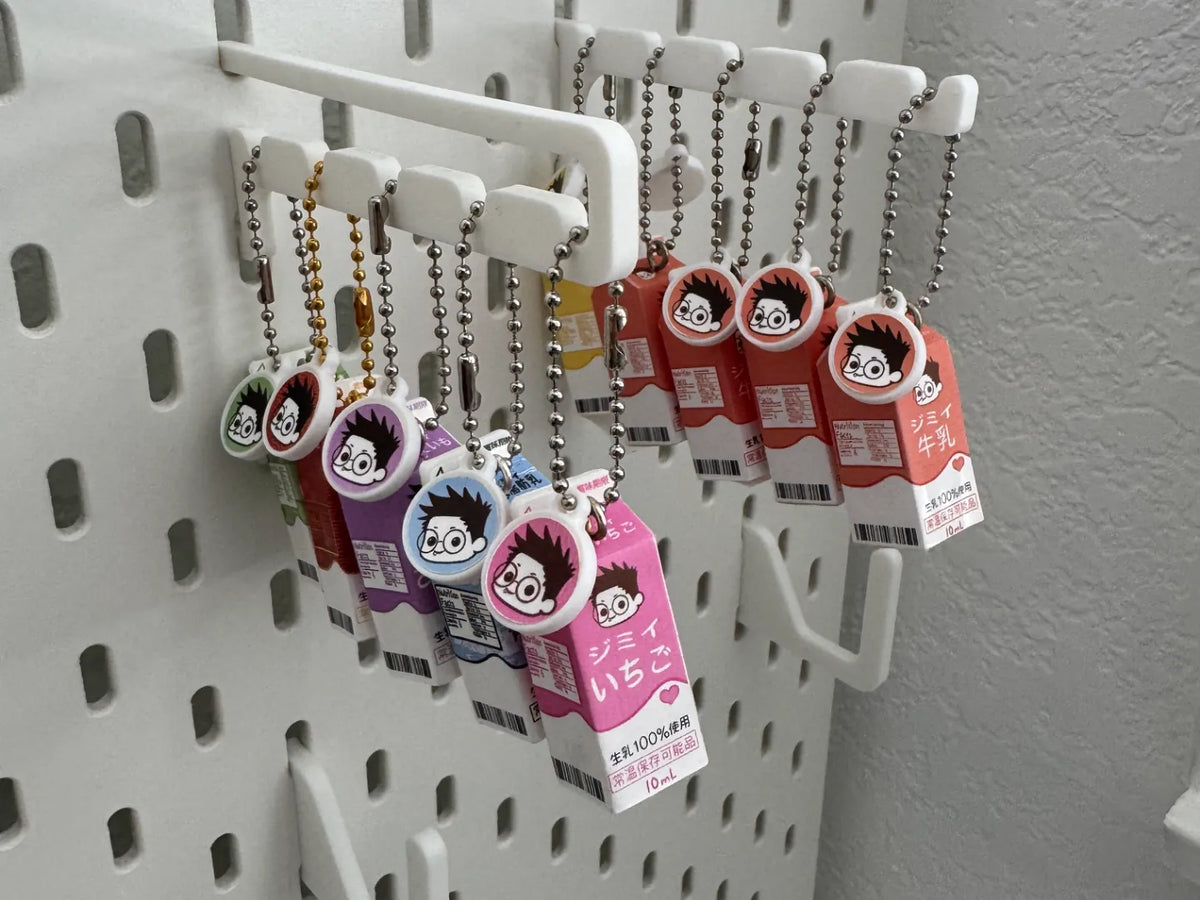 Crochets d'affichage de produits antivol pour porte-clés Skadis - Voyage Print