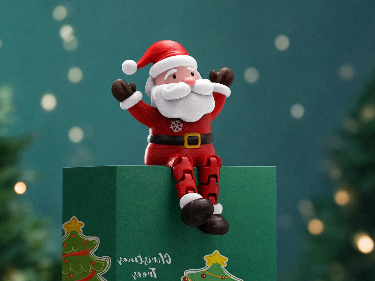 Décorations sur le thème de Noël – Poupée Père Noël articulée (Christmas Santa B) - Fêtes Print