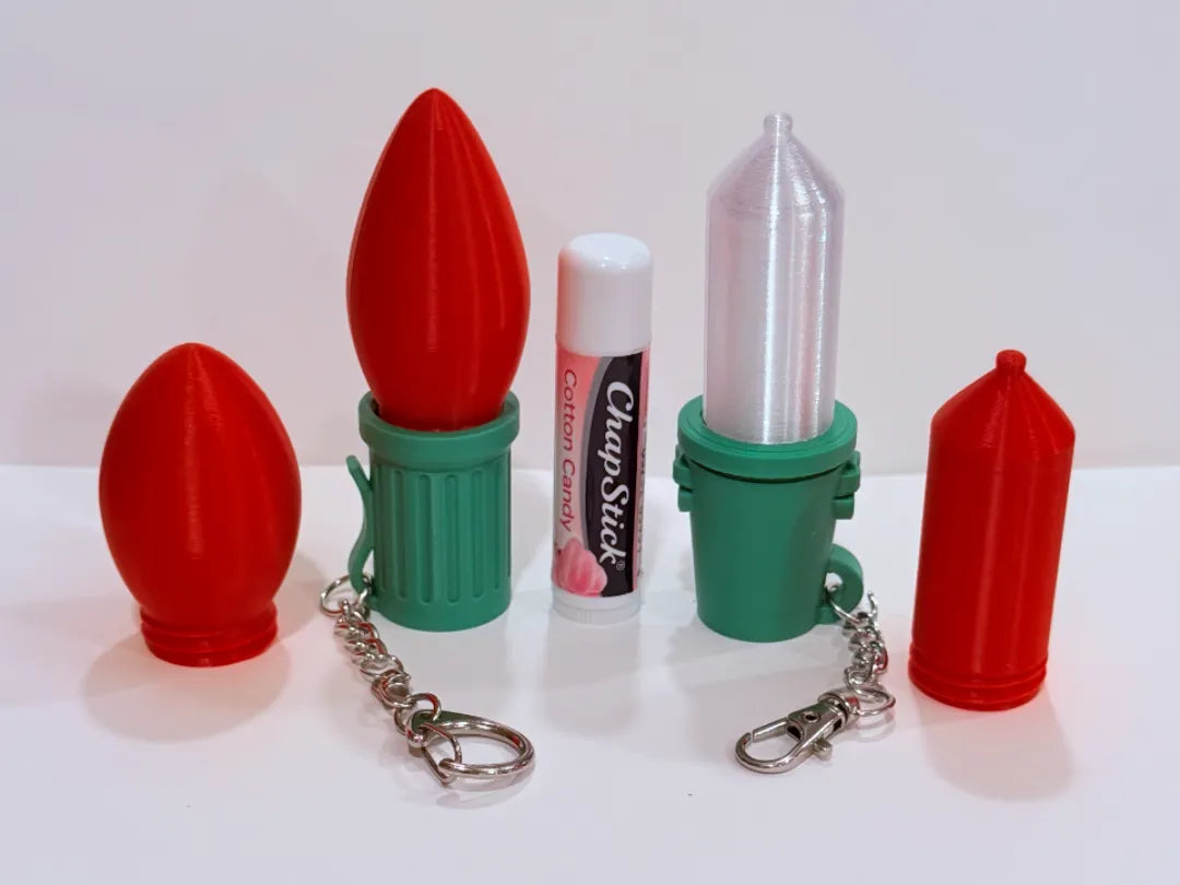 Contenant de baume à lèvres Boule de Noël avec porte-clés - Beauté Print
