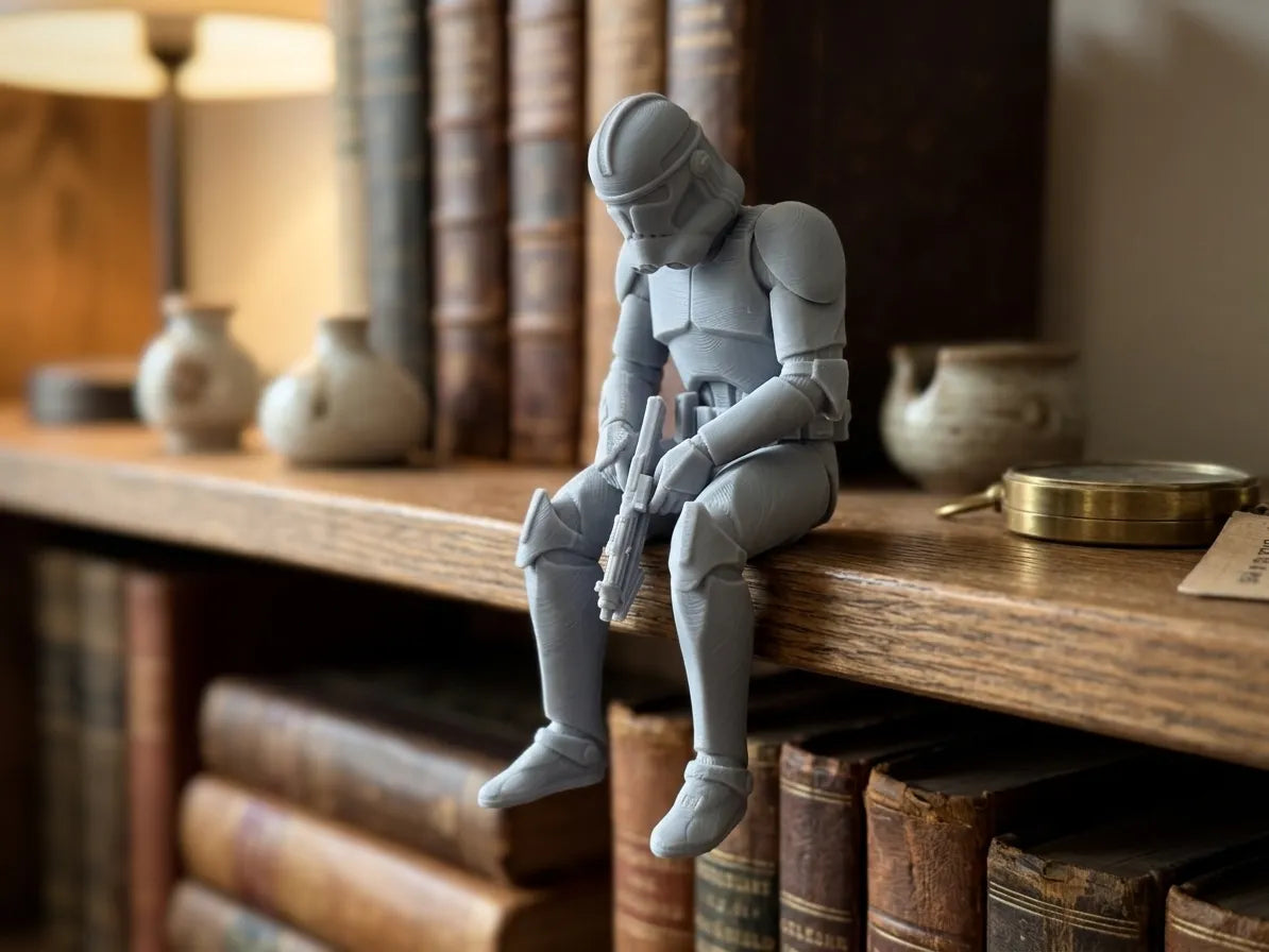 Triste figurine de Soldat Clone Star Wars qui s'assoit sur un rebord - Geek Print