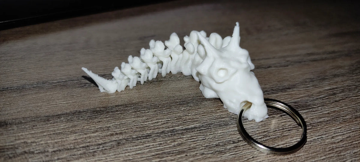 Petit dragon articulé en os - Jeux Print