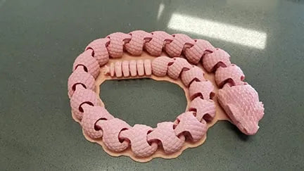 Serpent articulé avec un hochet super amusant - Bébé Print