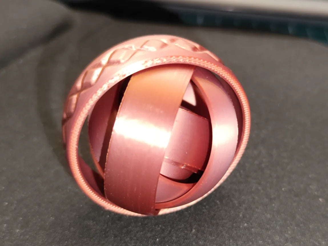 Toupie à gyroscope 9 anneaux - Bijoux Print