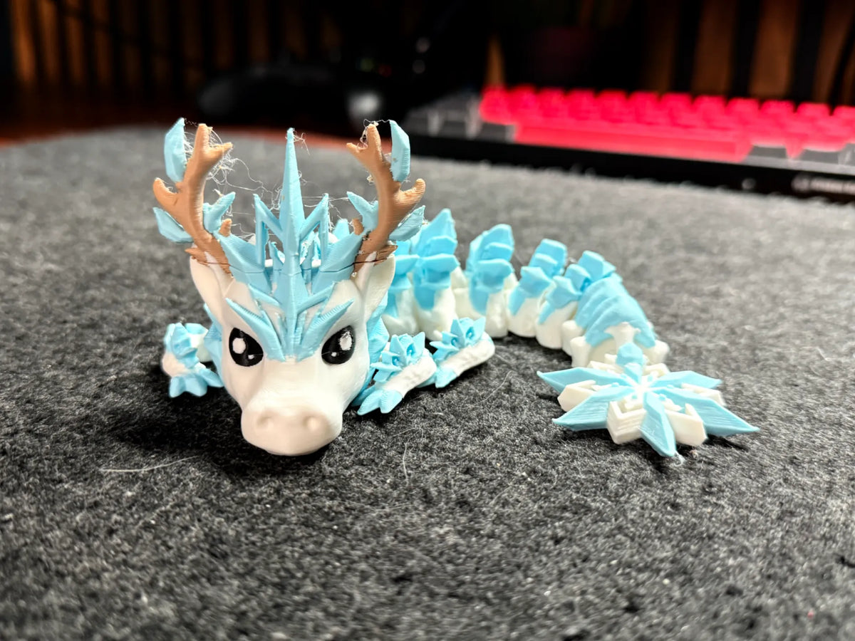 Bébé Dragon Articulé Flocon de Neige - Fêtes Print
