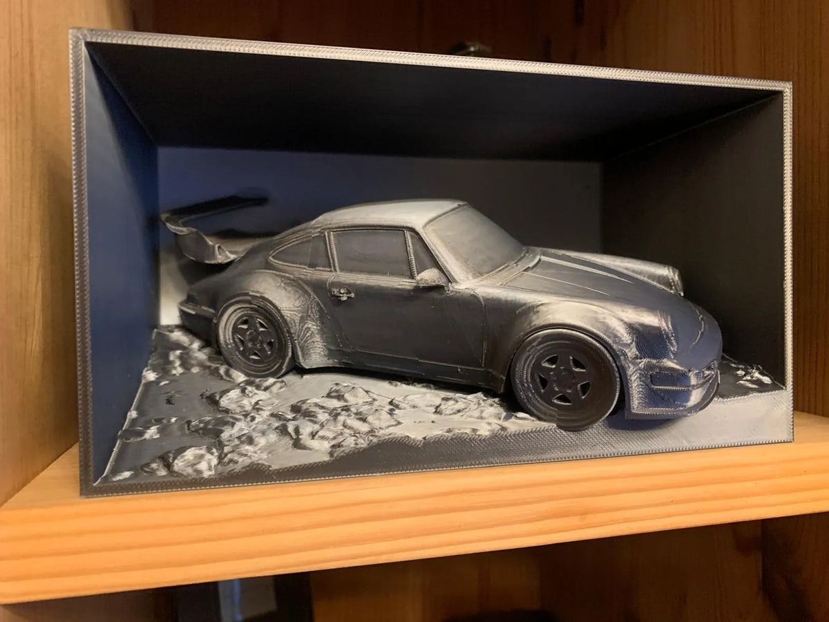 Porsche 911 sur gravier dans une boîte - Auto Print
