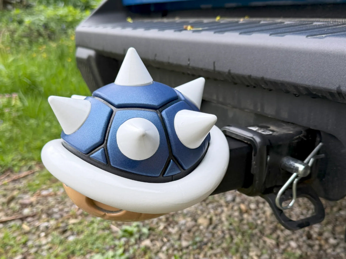 Cache-attelage en forme de carapace de Koopa de Mario Kart - Voyage Print