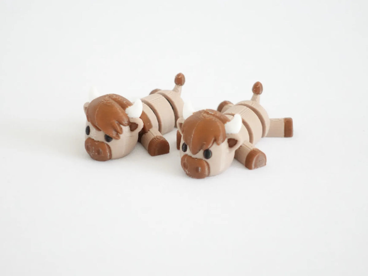 Animaux de poche articulés – Jeune vache Highland - Geek Print