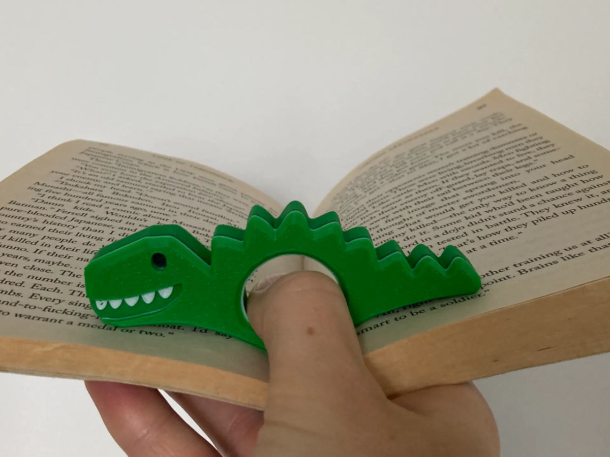 Support de livre ouvert Dino (Tient-page, Truc de livre) - Music Print