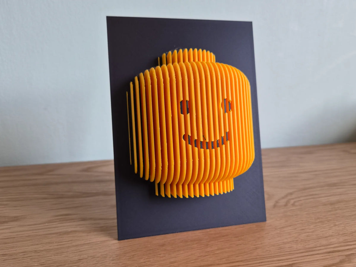 Œuvre sculpturale de tête de figurine inspirée des Legos - Art Print