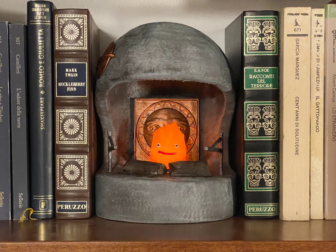 Coin lecture Foyer de Calcifer avec bougie chauffe-plat - Maquette Print