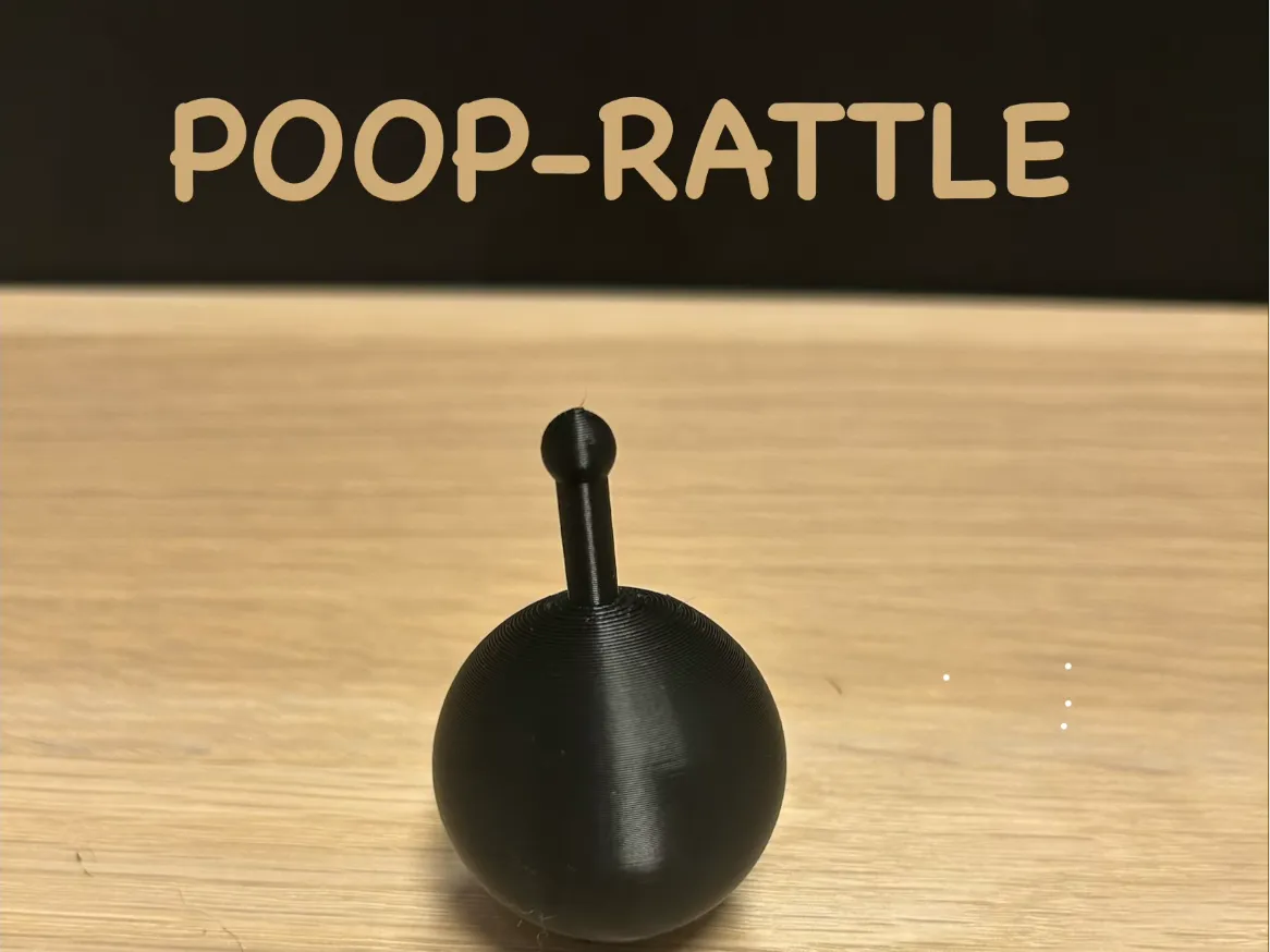 Mini Hochet à "poops" <10g - Bébé Print